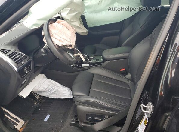 5UX43DT08R9W26883 2024 BMW X4 Black Front interior view