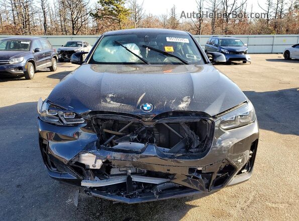 5UX43DT08R9W26883 2024 BMW X4 Black Front view