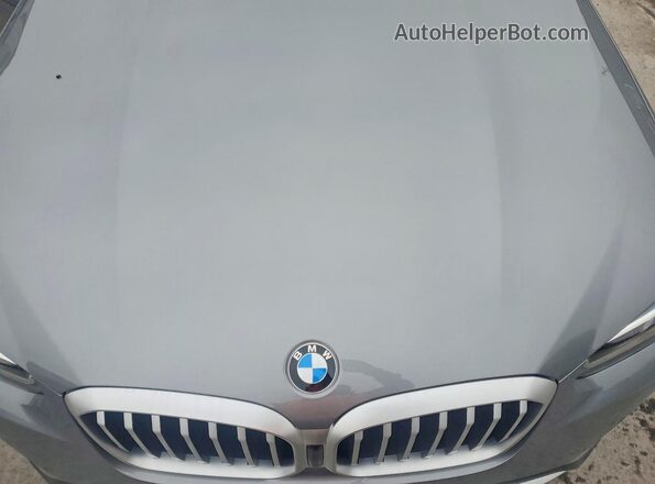 5UX53DP09P9R93898 2023 BMW X3 Silver Vista interior trasera