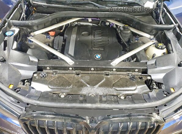 5UXCW2C07M9E43574 2021 BMW X7 Blue Widok wnętrza z tyłu
