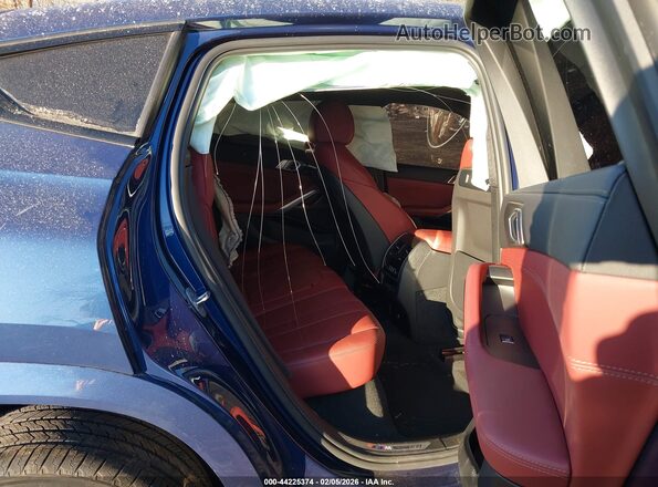 5UXCY6C02N9J92799 2022 BMW X6 Blue Vista de la etiqueta del VIN