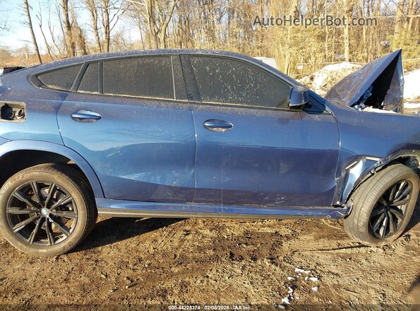 5UXCY6C02N9J92799 2022 BMW X6 Blue Vista interior trasera