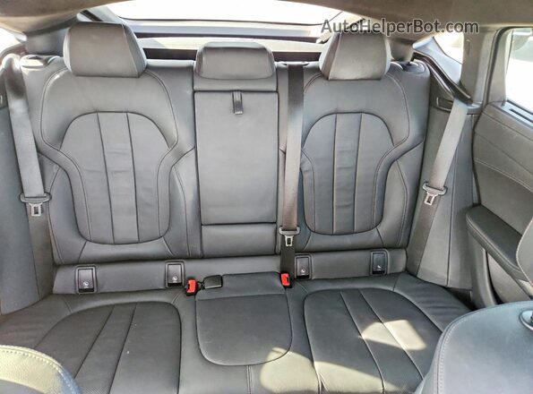 5UXCY6C05N9M73205 2022 BMW X6 White Rear seats view
