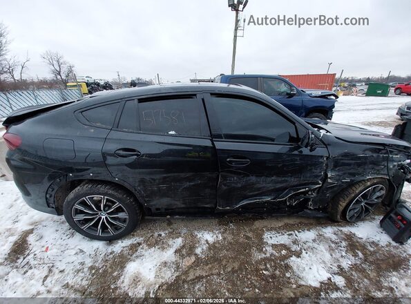 5UXCY6C08M9E11587 2021 BMW X6 Black Widok wnętrza z tyłu