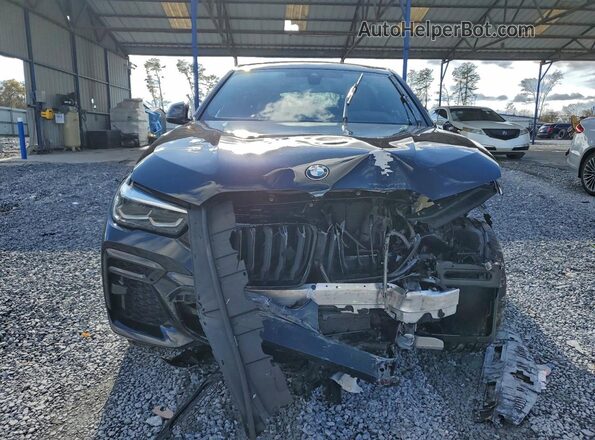 5UXCY6C09P9P95932 2023 BMW X6 Black Front view
