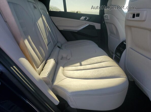 5UXTA6C01M9D34811 2021 BMW X5 Blue Widok tylnych siedzeń