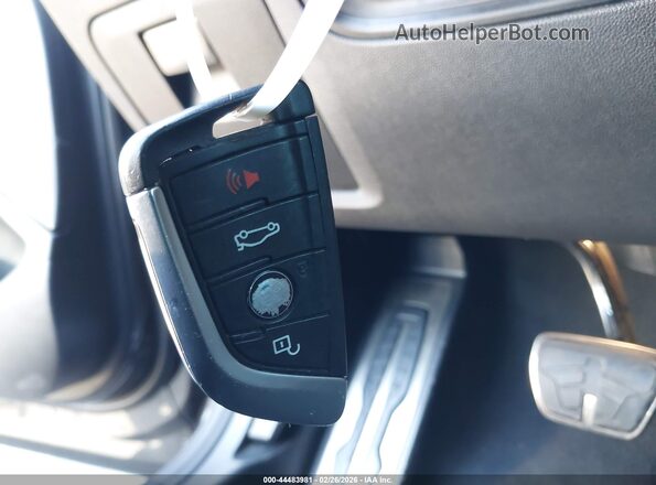 5UXUJ5C59K9A33100 2019 BMW X4 Black 