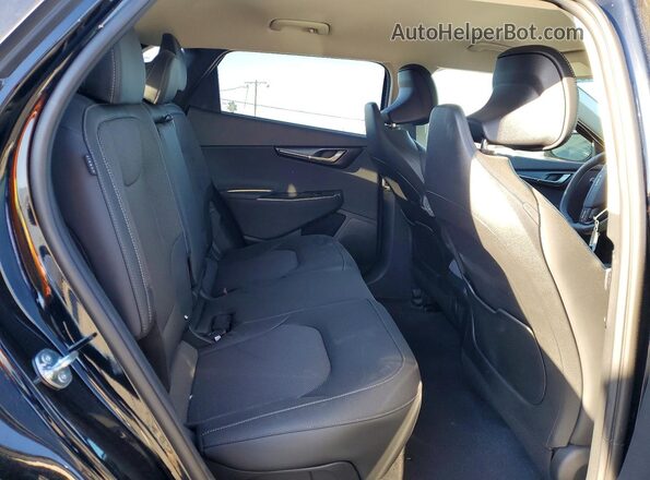 5XYC34JAXSG008946 2025 KIA EV6 Black Vista interior trasera