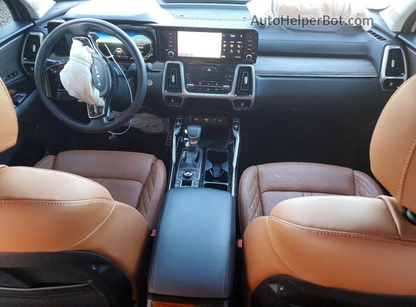 5XYRKDLF7PG239770 2023 KIA SORENTO Gray Vista del salpicadero