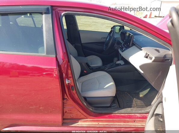 5YFEPMAE8NP374985 2022 TOYOTA LL Maroon Front interior view