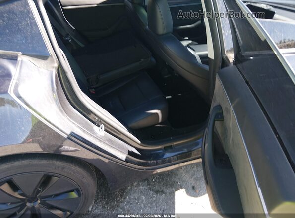 5YJ3E1EB2SF904130 2025 TESLA MODEL 3 Black VIN კოდის სტიკერის ხედი