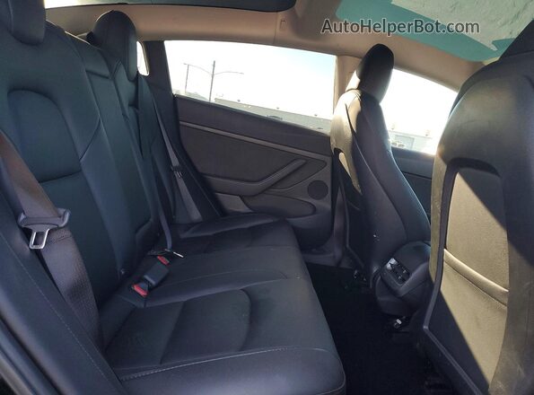 5YJ3E1EB5PF607876 2023 TESLA MODEL Black Vista de los asientos traseros