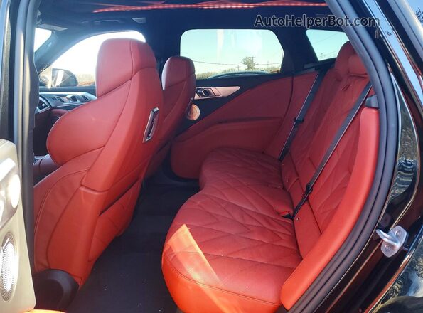 5YM33CS07S9Y57716 2025 BMW XM Black Вид задньої частини салону