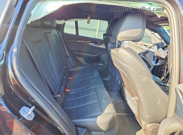 5YMUJ0C0XM9F93596 2021 BMW X4 Black 