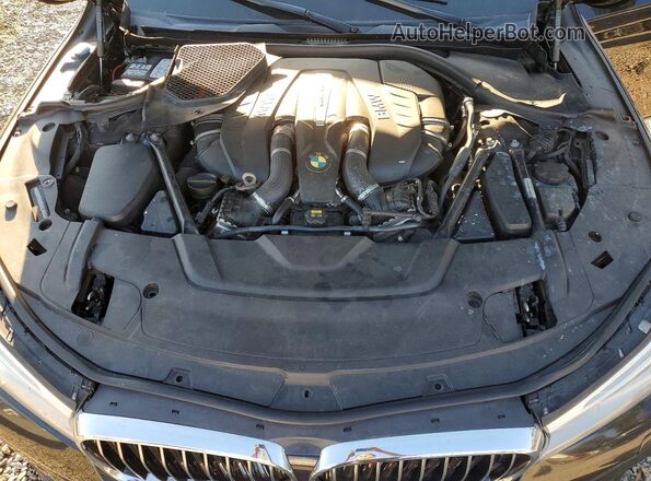 WBA7F0C55GGL99569 2016 BMW 7 SERIES Black Vista del compartimento del motor