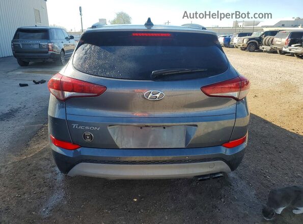 KM8J33A23JU629142 2018 HYUNDAI TUCSON Gray 