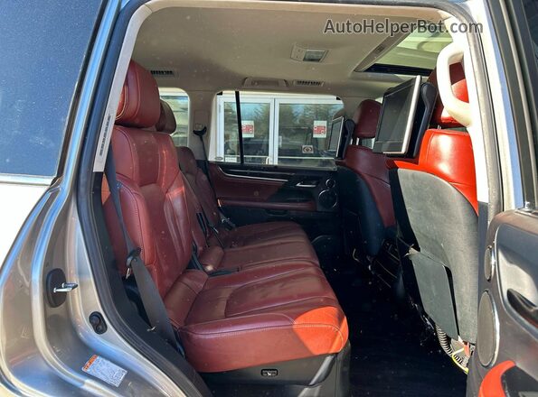 JTJHY7AX1J4257689 2018 LEXUS LX Золотой Вид салона спереди