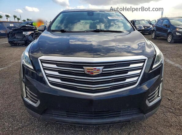 1GYKNCRS7HZ130553 2017 CADILLAC XT5 Черный Вид салона спереди