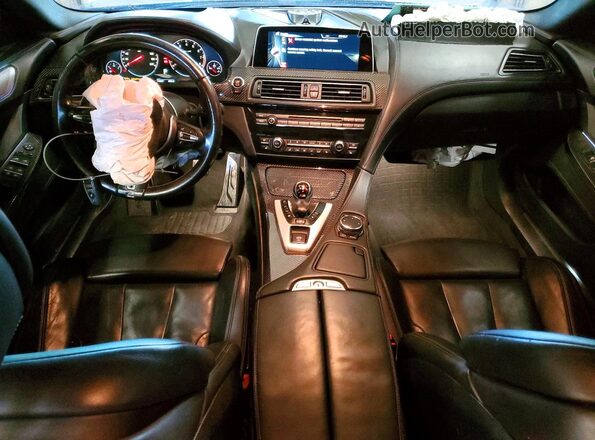 WBS6E9C54GGF92636 2016 BMW M6 Black Вид щитка приладів