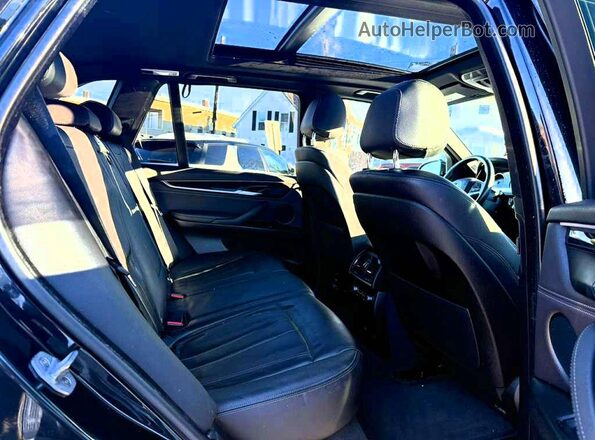 5UXKT0C56J0V99901 2018 BMW X5 Black Вид панелі приладів