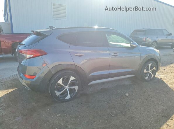 KM8J33A23JU629142 2018 HYUNDAI TUCSON Gray 