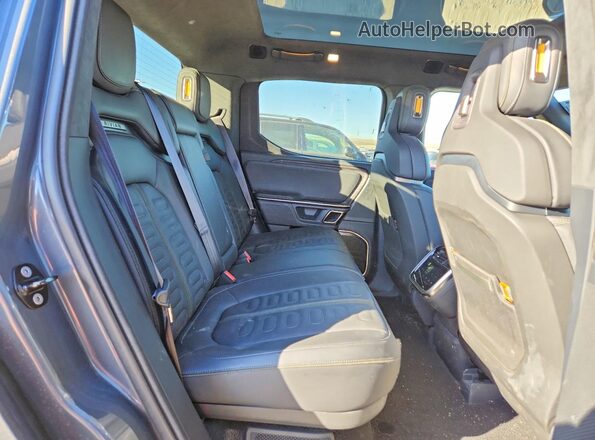 7FCTGAAA1NN011275 2022 RIVIAN R1T Charcoal Rear seats view