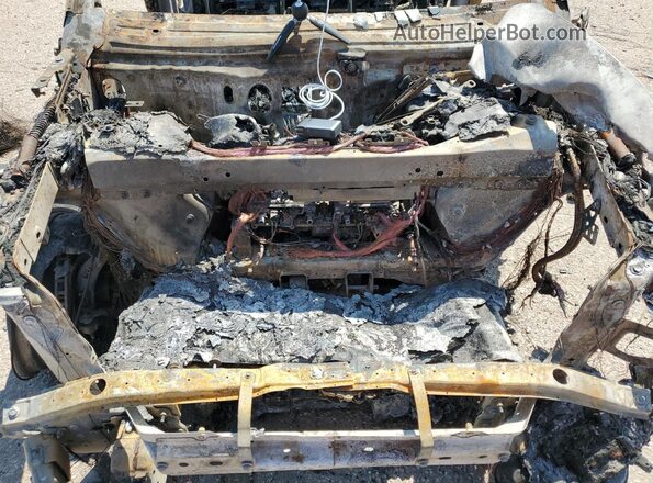 7FCTGAAA1NN014631 2022 RIVIAN R1T Burn Vista interior trasera