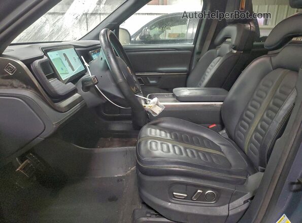 7FCTGAAA5RN032328 2024 RIVIAN R1T Серый Вид салона спереди