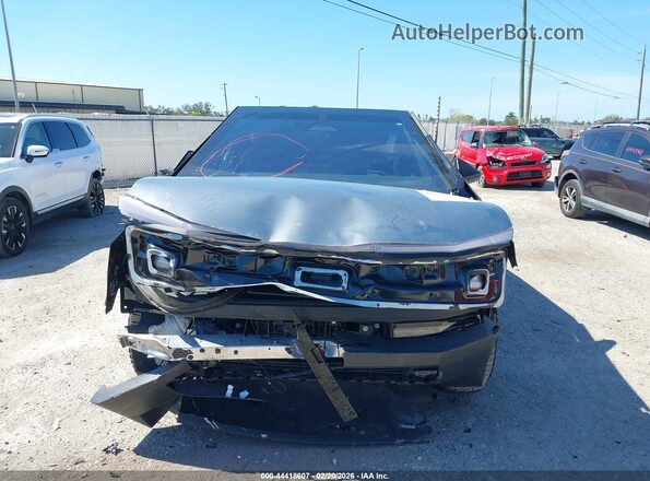7G2CEHED5RA011044 2024 TESLA CYBERTRUCK Silver Rear interior view