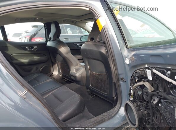 7JRL12TK6RG319878 2024 VOLVO S60 Light Blue Widok naklejki z numerem VIN