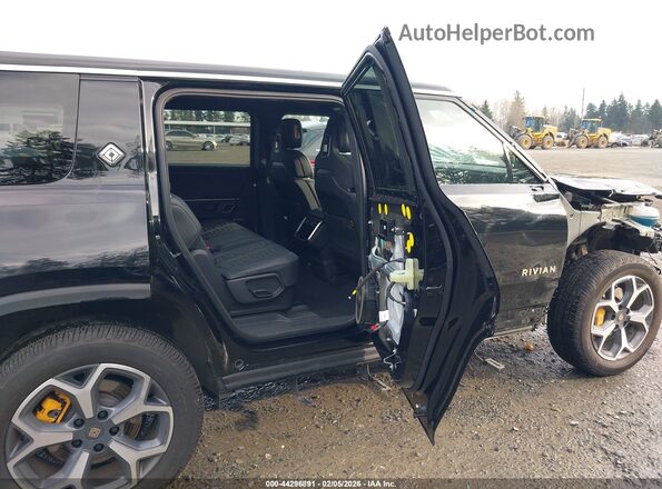 7PDSGABA9PN013254 2023 RIVIAN R1S Black VIN sticker view