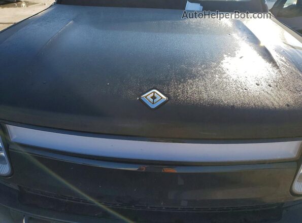 7PDSGBBA9RN033044 2024 RIVIAN R1S Black Widok wnętrza z tyłu