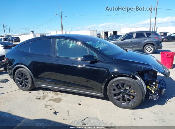 7SAXCBE59RF436689 2024 TESLA MODEL X Black Սալոնի հետևի տեսք