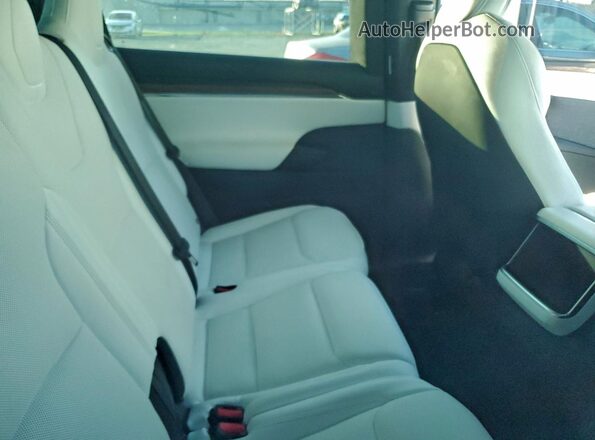 7SAXCDE59RF436624 2024 TESLA MODEL White Rear interior view