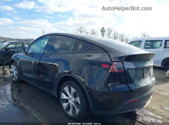 7SAYGAEE4PF829385 2023 TESLA MODEL Y Black Rear left