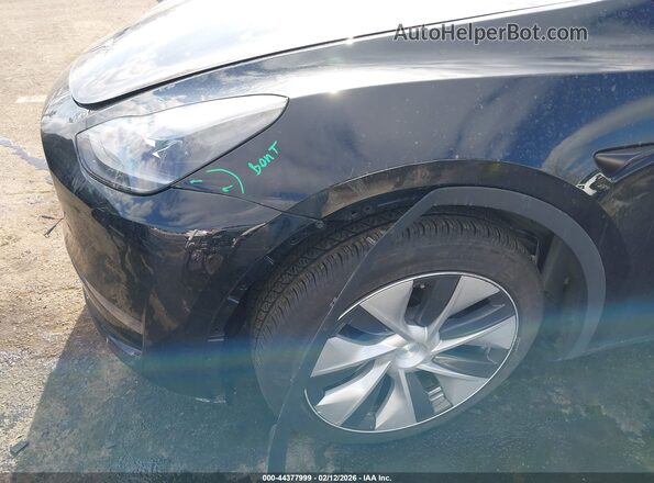 7SAYGAEE4PF829385 2023 TESLA MODEL Y Black Front view
