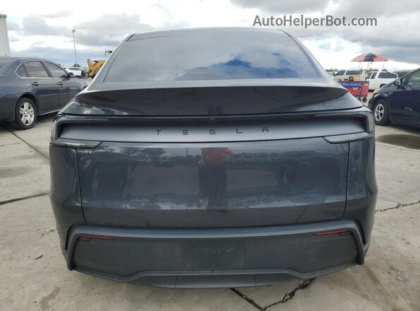 7SAYGDED1TF429187 2026 TESLA MODEL Gray Vista trasera