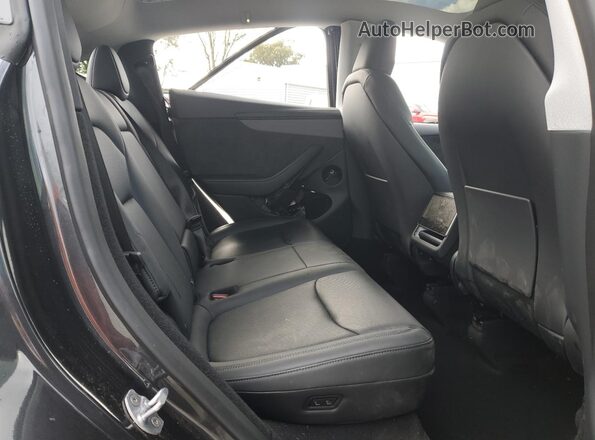 7SAYGDED1TF429187 2026 TESLA MODEL Gray Vista de los asientos traseros