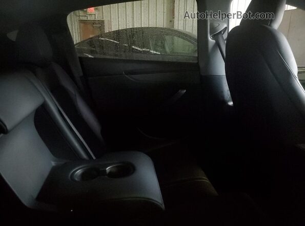 7SAYGDED2TF382672 2026 TESLA MODEL White Հետևի նստատեղերի տեսք