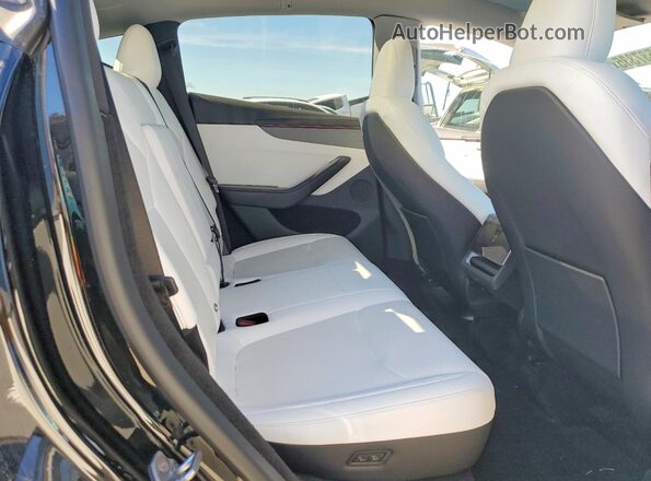 7SAYGDED8TA454679 2026 TESLA MODEL Black Rear interior view