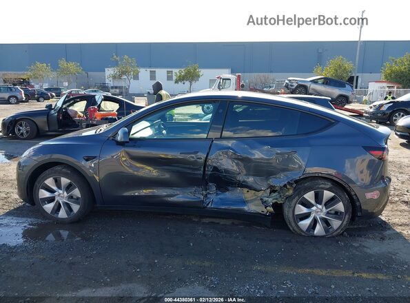 7SAYGDEDXPF977727 2023 TESLA MODEL Y Gray Սալոնի 360 աստիճան տեսք