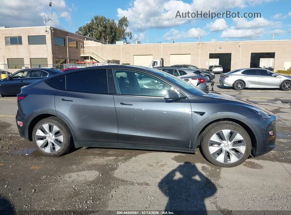 7SAYGDEDXPF977727 2023 TESLA MODEL Y Gray Սալոնի հետևի տեսք