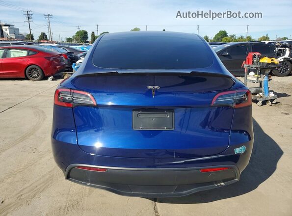 7SAYGDEDXSF227916 2025 TESLA MODEL Blue Front interior view