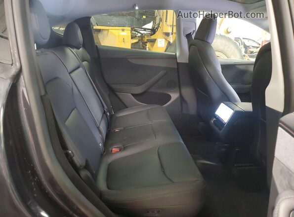 7SAYGDEE1TF339126 2026 TESLA MODEL Gray Vista interior trasera