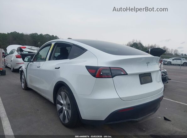 7SAYGDEE3PF687399 2023 TESLA MODEL Y White Rear left