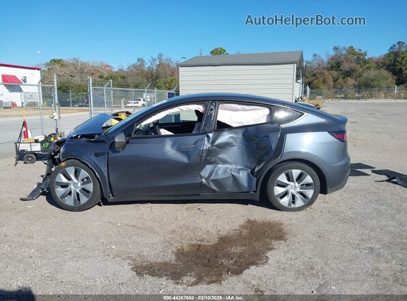 7SAYGDEE4PA161053 2023 TESLA MODEL Y Серый Вид задней части салона