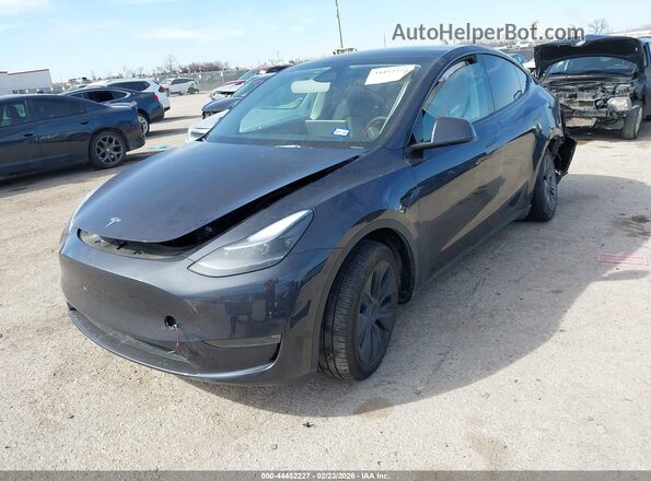 7SAYGDEE6RA305317 2024 TESLA MODEL Y Black Առջևի ձախ երեք քառորդ տեսարան