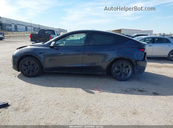 7SAYGDEE6RA305317 2024 TESLA MODEL Y Black Սալոնի հետևի տեսք