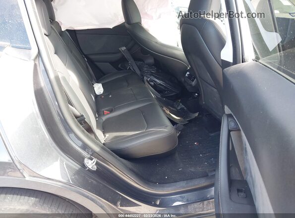 7SAYGDEE6RA305317 2024 TESLA MODEL Y Black VIN կոդի պիտակի տեսք