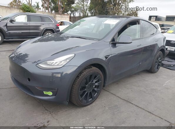 7SAYGDEE8PA078726 2023 TESLA MODEL Y Gray Przód lewy